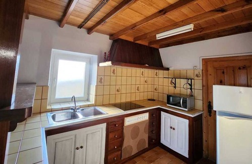 Loza Apartment | Cozy La Casita del Pueblo: Pet-Friendly Family Retreat