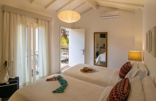 Ossos Hotel | Relax at La Chimère Buzios Essence with Pool & Family Fun