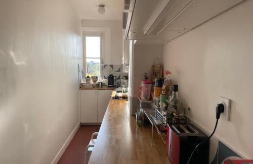 Quartier des Grandes-Carrieres Apartment | Experience TOURLAQUE: Top-Rated with Restaurant & Breakfast
