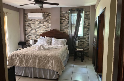 Corozal Hotel | Discover La Delphina B&B Bar and Grill Hotel: Family-Friendly Retreat