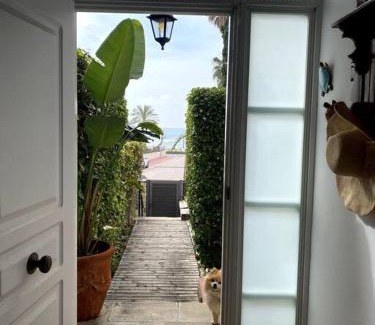 Comarruga Villa | Experience La Digue Beach House: Oceanfront & Pet Friendly