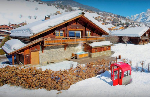 La Clusaz Ski Chalet | Experience La Ferme à Juju: Ski-in/Ski-out with Spa & Views