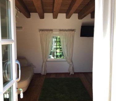 Nogaredo al Torre Apartment | Unique Family Retreat at La Foresteria di Villa Gorgo