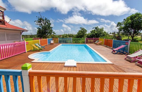 Capesterre-de-Marie-Galante House | Discover La Tourterelle Rose: Pet-Friendly Retreat with Pool