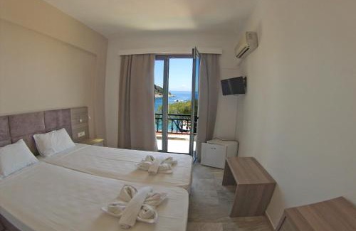Korithi Hotel | Oceanfront Retreat at La Grotta with Breakfast & Pet Friendly