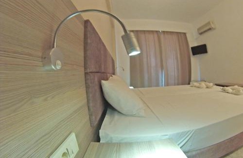 Korithi Hotel | Oceanfront Retreat at La Grotta with Breakfast & Pet Friendly