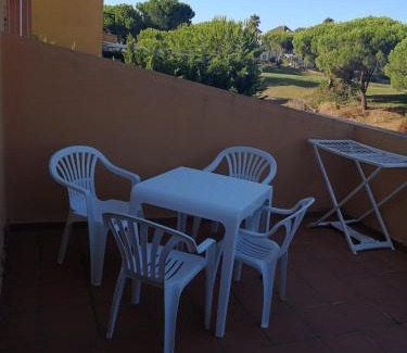 Islantilla Apartment | Discover La Hacienda: Pet-Friendly Retreat with Pool Access