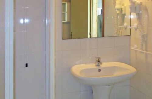 Limone sul Garda Apartment | Relax at La Limonaia: Poolside Oasis with Ocean Views