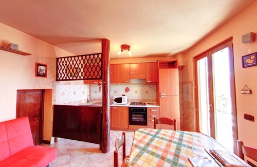 Tavernola House | Experience La Magotina: Iseo Lake Views & Family-Friendly Amenities