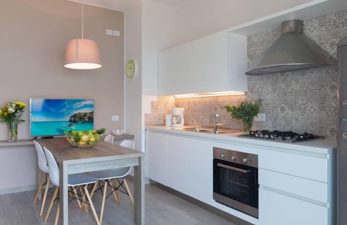 Magugnago Apartment | Seaside Serenity at La Maison Blanche by Interhome