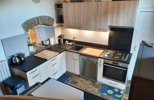 Sarrogna House | Discover The Old Blue House: Renovated Retreat with Garden