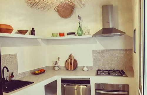 Cagliari Apartment | Experience La Maison Boheme: Ocean Views & Spa Retreat