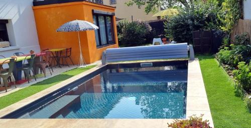 Romans-sur-Isere Apartment | Explore La Maison Pop: Oceanfront Garden Retreat 9.8/10
