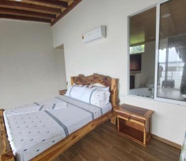 Juanchaco Hotel | Discover La Manigua Hostal: Top-Rated Stay with Restaurant