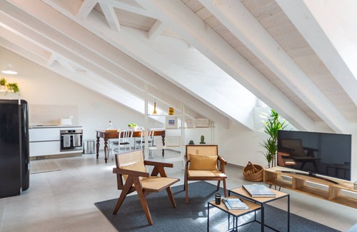 Chinatown Apartment | Elegant La Mansarda di Sarpi Apartment in Central Milan