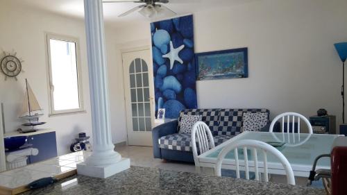 Scauri Apartment | Oceanfront Retreat at La Marina Gardens Beach - Rated 9.3/10