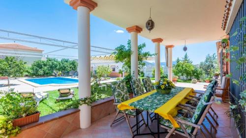 Teba House | Discover La Martinica Teba: Family-Friendly Retreat with Pool
