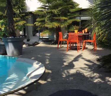 Vannes House | La Palmeraie: Oceanfront Getaway with Pool & Restaurant