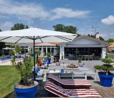 Saint-Jean-d'Illac Bed & Breakfast | Experience La Parenthèse du Las: Oceanfront Escape with Spa