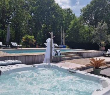 Saint-Jean-d'Illac Bed & Breakfast | Experience La Parenthèse du Las: Oceanfront Escape with Spa