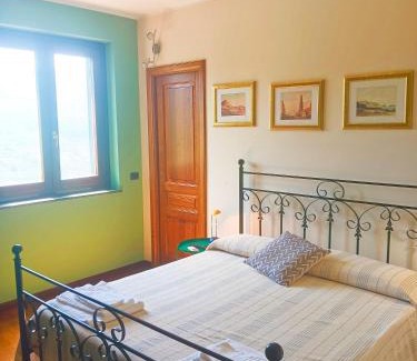 Lauria Bed & Breakfast | Family-Friendly Retreat at La Quercia di Massena with Ocean View