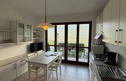 Pieve Apartment | Lake View Haven: Family-Friendly Apartment with Pool Access