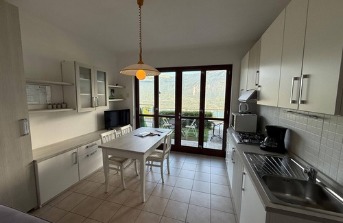 Pieve Apartment | Lake View Haven: Family-Friendly Apartment with Pool Access