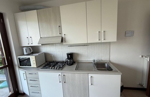 Pieve Apartment | Lake View Haven: Family-Friendly Apartment with Pool Access
