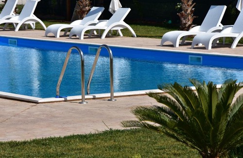 Korithion Apartment | Discover La Terra Nostra: Oceanfront Oasis with Pool