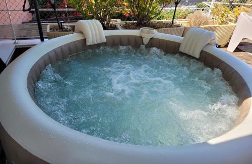 Donville-les-Bains Apartment | Relax at La Terrasse: Hot Tub & Sea View Near the Beach