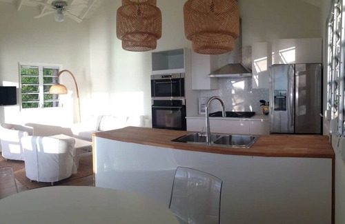 Dickenson Bay Condo | Dreamy Oceanfront Escape with Spa & Breakfast Included