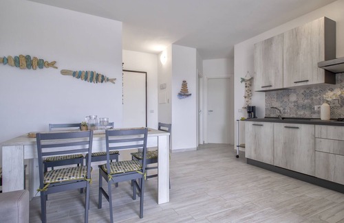 La Muddizza Apartment | La terrazza sulla piscina by Interhome