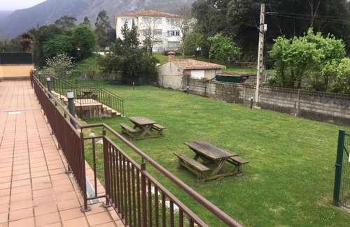 Posada de Llanes Apartment | La Tilar: Family-Friendly Apartment with Spacious Terrace