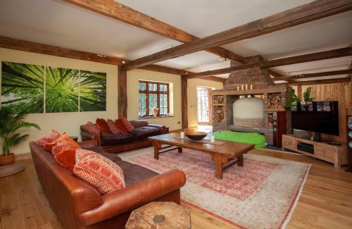 Olveston Villa | Experience La Villa Olli: Natural Pool & Inviting Hot Tub
