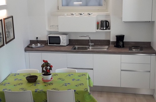 Malcesine House | Experience LA VILLETTA: Scenic Views & Kitchen Amenities