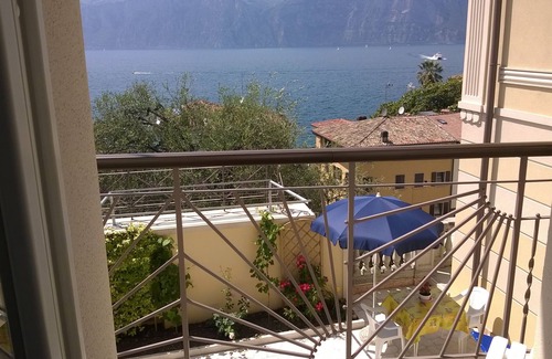 Malcesine House | Experience LA VILLETTA: Scenic Views & Kitchen Amenities