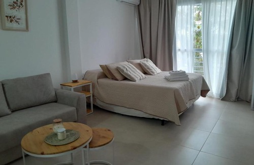 Concepcion del Uruguay Apartment | Stylish LA VIZNAGA: 4-Star Comfort with Breakfast Included
