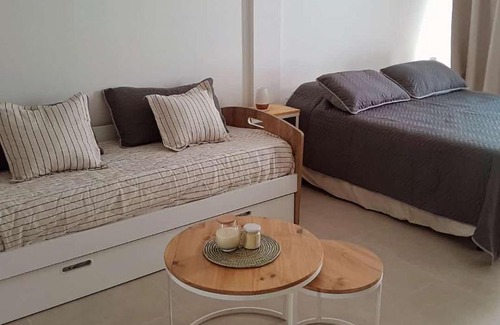 Concepcion del Uruguay Apartment | Stylish LA VIZNAGA: 4-Star Comfort with Breakfast Included