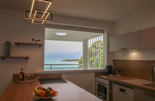 Perinet Apartment | Experience La Vue du Phare with Private Beach Access