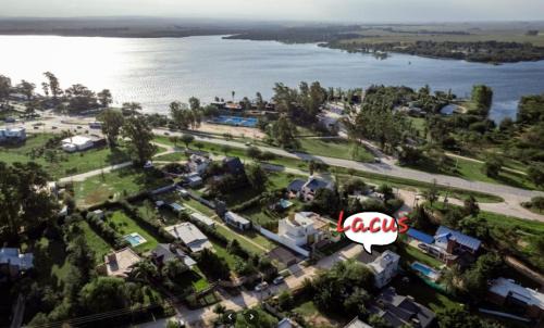 Almafuerte Apartment | Experience Lacus: Lakeside Retreat with Oceanfront Views