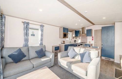 Otterton House | Stylish 12ft-Wide Caravan with Oceanfront Views & Spa