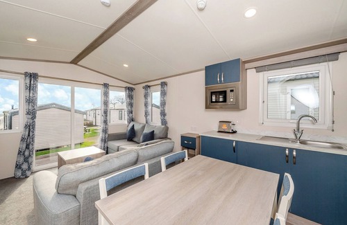 Otterton House | Stylish 12ft-Wide Caravan with Oceanfront Views & Spa