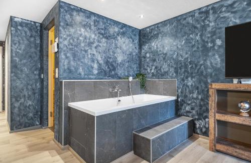 Leukerbad Apartment | Relax at Lady Hamilton: A 4-Star Hotel with Pool & Hot Tub