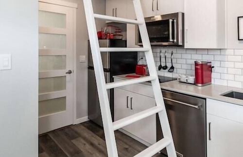 West Edmonton House | Cozy Ladybug Lane: A Tiny Home with Breakfast Included