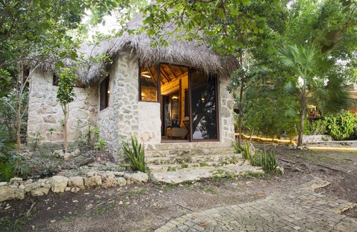 Mario Villanueva Madrid Cabin | Cozy Lagoon Front Suite with Bikes, Kayaks & Spa Access