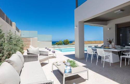 Panormos Villa | Oceanfront Lagoon Seaside Villa: Guest Rated 10/10 Retreat