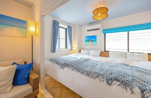 Tateishi Apartment | LAGOON Suite OHANA - 2 Serta double bed & Asian resort sofa, #205, 11 minutes to Asakusa
