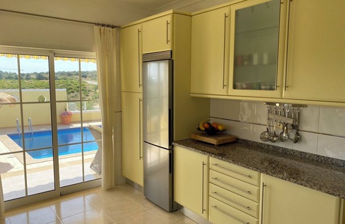 Chinicato Villa | Explore Meia Praia Villa with Private Pool & Stunning Views