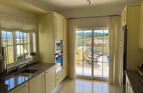 Chinicato Villa | Explore Meia Praia Villa with Private Pool & Stunning Views