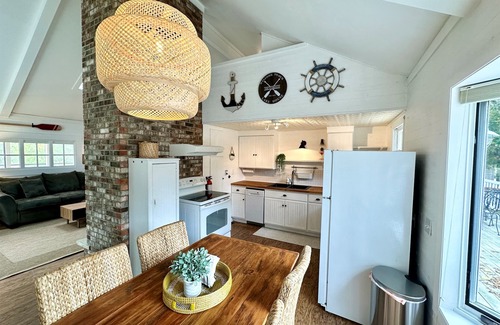 Nekoosa Cottage | Exquisite Sand Beach Retreat with Private Dock & Kayaks